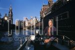 01-01-1978 Ramses Shaffy on location in Amsterdam.

[keywords]Full Length, Boat, Canal[/keywords]
